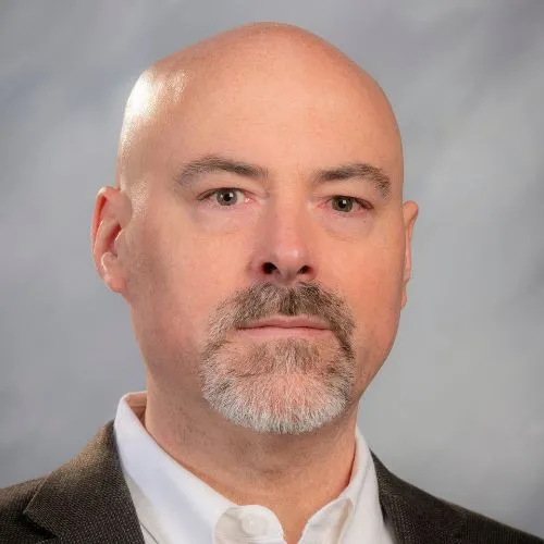 Dr. Daniel Decelles 